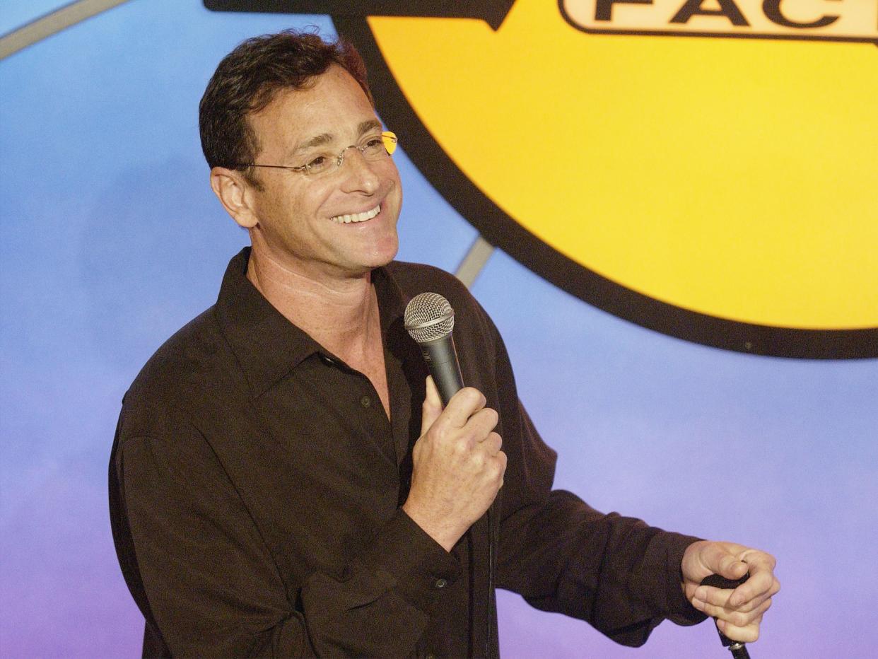 Comedian Bob Saget performs onstage at the Much Love Animal Rescue Second Annual Comedy Charity Event on July 29, 2003, at the Laugh Factory in Hollywood, Calif.