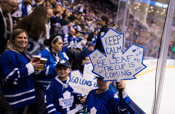 TORONTO, ON – APRIL 9: Young fans hold signs during before the Toronto Maple Leafs play against the Columbus Blue Jackets at the Air Canada Centre on April 9, 2017 in Toronto, Ontario, Canada. (Photo by Mark Blinch/NHLI via Getty Images) *** Local Caption ***