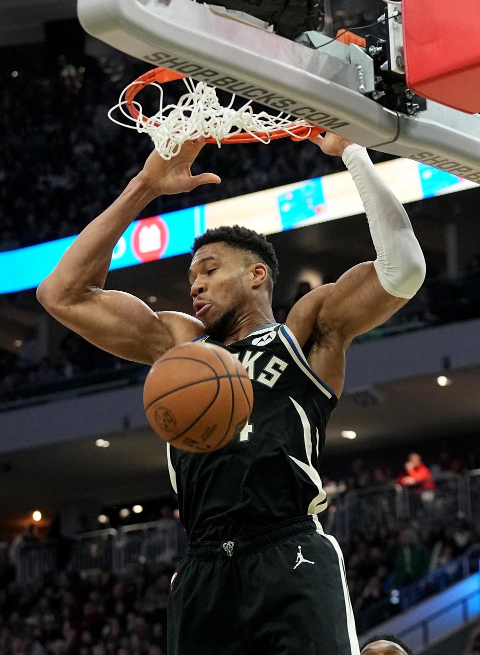 Milwaukee Bucks forward Giannis Antetokounmpo dunks for two of his 30 points Saturday against the New Orleans Pelicans at Fiserv Forum.