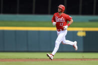 Cincinnati Reds' Kyle Farmer runs the bases after hitting a three-run home run during the first inning of a baseball game against the San Francisco Giants in Cincinnati, Saturday, May 28, 2022. (AP Photo/Aaron Doster)