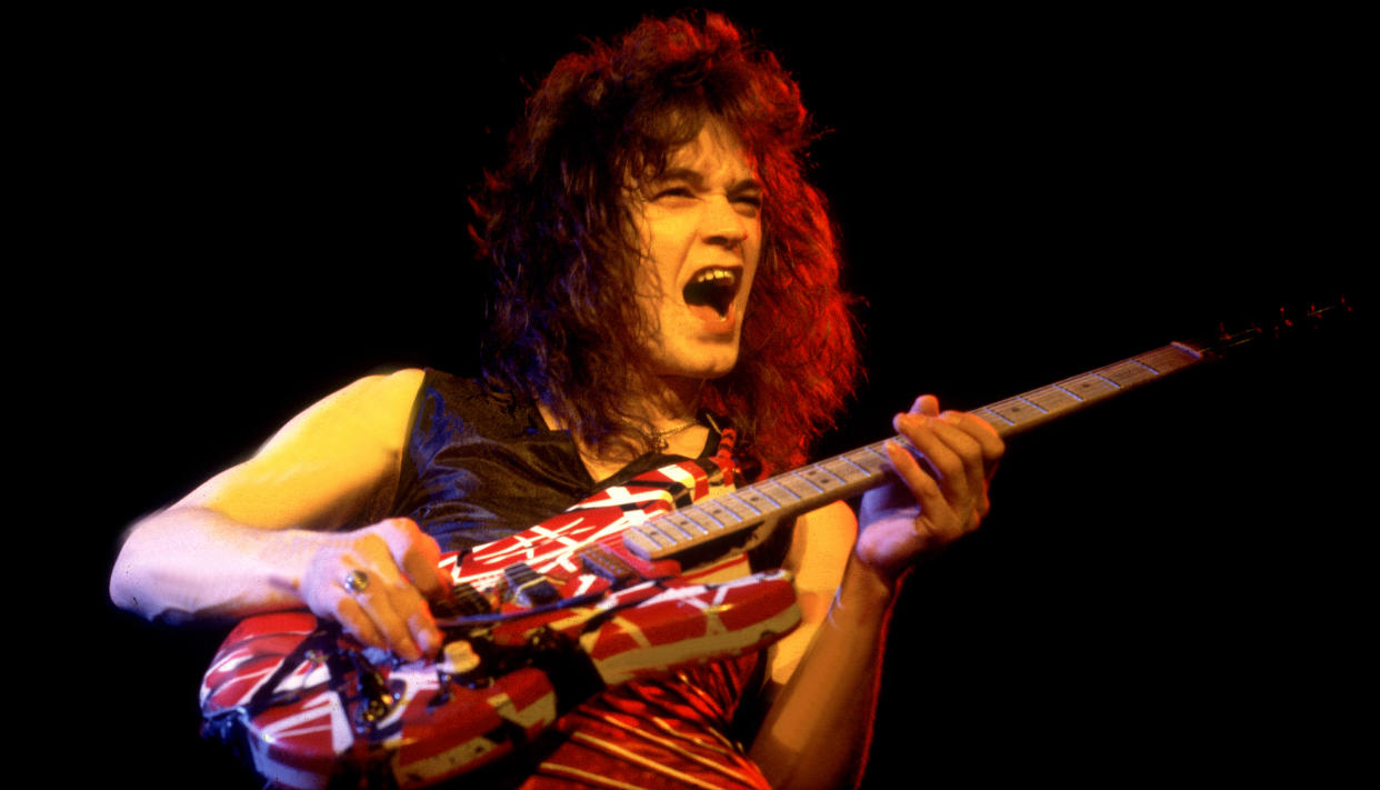  Eddie Van Halen performs onstage with Van Halen at the Aragon Ballroom in Chicago, Illinois on April 26, 1979. 