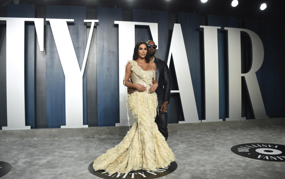 Kim Kardashian, left, and Kanye West arrive at the Vanity Fair Oscar Party on Sunday, Feb. 9, 2020, in Beverly Hills, Calif. (Photo by Evan Agostini/Invision/AP)