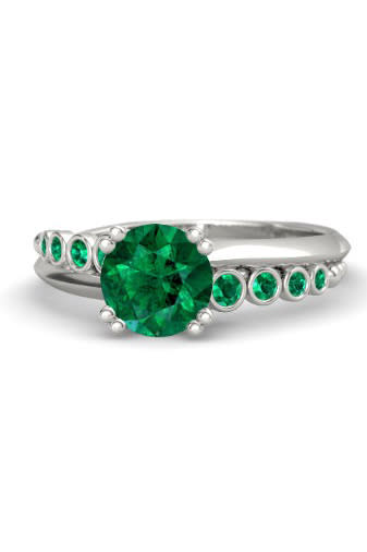 <p><em><a rel="nofollow noopener" href="https://www.gemvara.com/jewelry/isabella-ring/round-emerald-14k-white-gold-ring-with-emerald/9x7k" target="_blank" data-ylk="slk:Round-Cut Emerald Isabella Ring;elm:context_link;itc:0;sec:content-canvas" class="link ">Round-Cut Emerald Isabella Ring</a>, GEMVARA, $5,380</em><br></p>