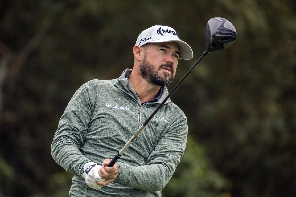 Brian Harman watches his drive off the second tee during the final round of the RSM Classic golf tournament, Sunday, Nov. 20, 2022, in St. Simons Island, Ga. (AP Photo/Stephen B. Morton)