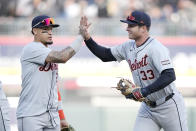 Detroit Tigers' Javier Baez, left, and Colt Keith celebrate the team's 1-0 shutout of the Chicago White Sox after the White Sox's home opener baseball game Thursday, March 28, 2024, in Chicago. (AP Photo/Charles Rex Arbogast)