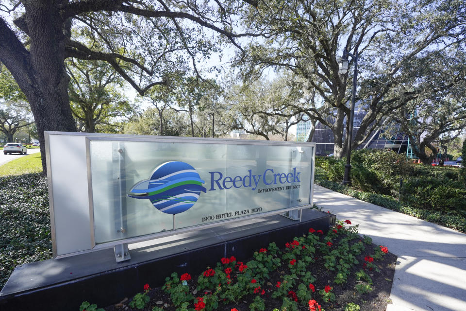 FILE - A sign near the entrance of the Reedy Creek Improvement District administration building is seen on Feb. 6, 2023, in Lake Buena Vista, Fla. The first meeting of the new board of Walt Disney World’s government — overhauled by sweeping legislation signed by Republican Gov. Ron DeSantis as an apparent punishment for Disney publicly challenging Florida’s so-called “Don’t Say Gay” bill — dealt with the rote affairs any other municipal government handles. Board members on Wednesday, March 8, faced calls for better firefighter equipment, lessons on public records requests and bond ratings. They replaced a board that had been controlled by Disney during the previous 55 years that the government operated as the Reedy Creek Improvement District. (AP Photo/John Raoux, File)