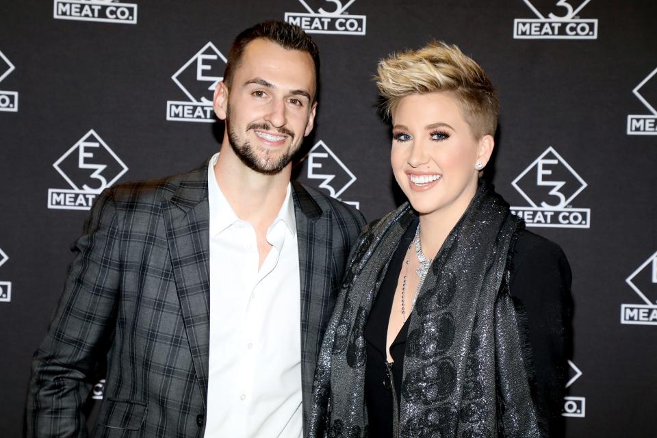 NASHVILLE, TENNESSEE - NOVEMBER 20: Nic Kerdiles (L) and Savannah Chrisley attend the grand opening of E3 Chophouse Nashville on November 20, 2019 in Nashville, Tennessee. (Photo by Danielle Del Valle/Getty Images for E3 Chophouse Nashville) ORG XMIT: 775440759 [Via MerlinFTP Drop]