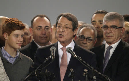 Newly elected president Nicos Anastasiades speaks during a proclamation ceremony after the second round of the presidential election, at Eleftheria Hall in Nicosia, Cyprus, February 4, 2018. REUTERS/Yiannis Kourtoglou