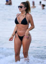 <p>Larsa Pippen takes a dip at the beach in Miami on Sunday.</p>