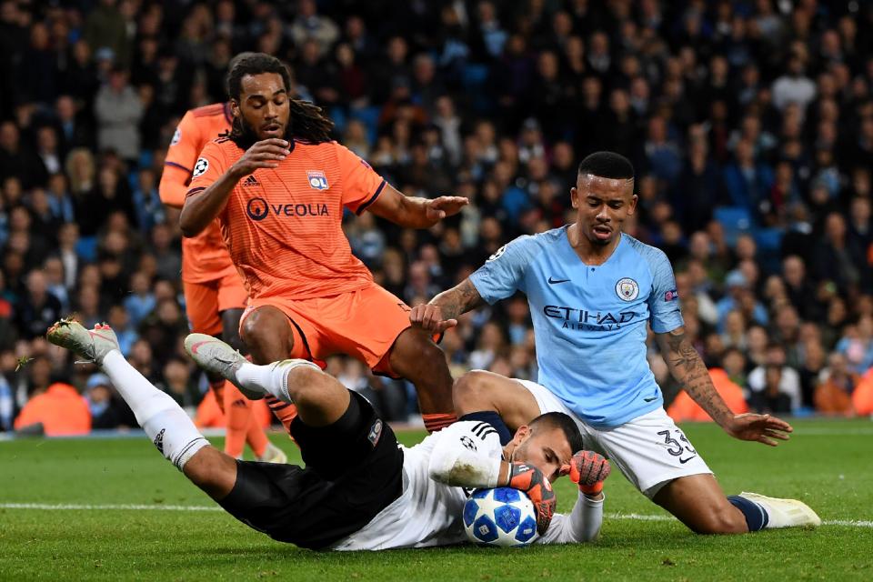 Lyon’s goalkeeper Anthony Lopes stops Gabriel Jesus’ saves from Raheem Sterling