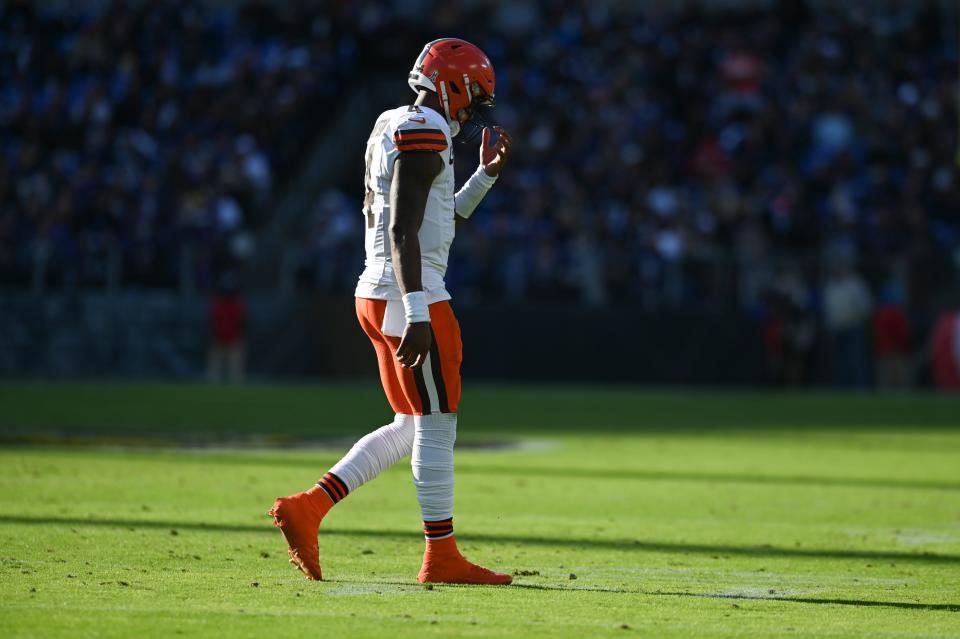 Cleveland Browns quarterback Deshaun Watson (4) walks to the sidelines during the first half against the Baltimore Ravens on Sunday in Baltimore.