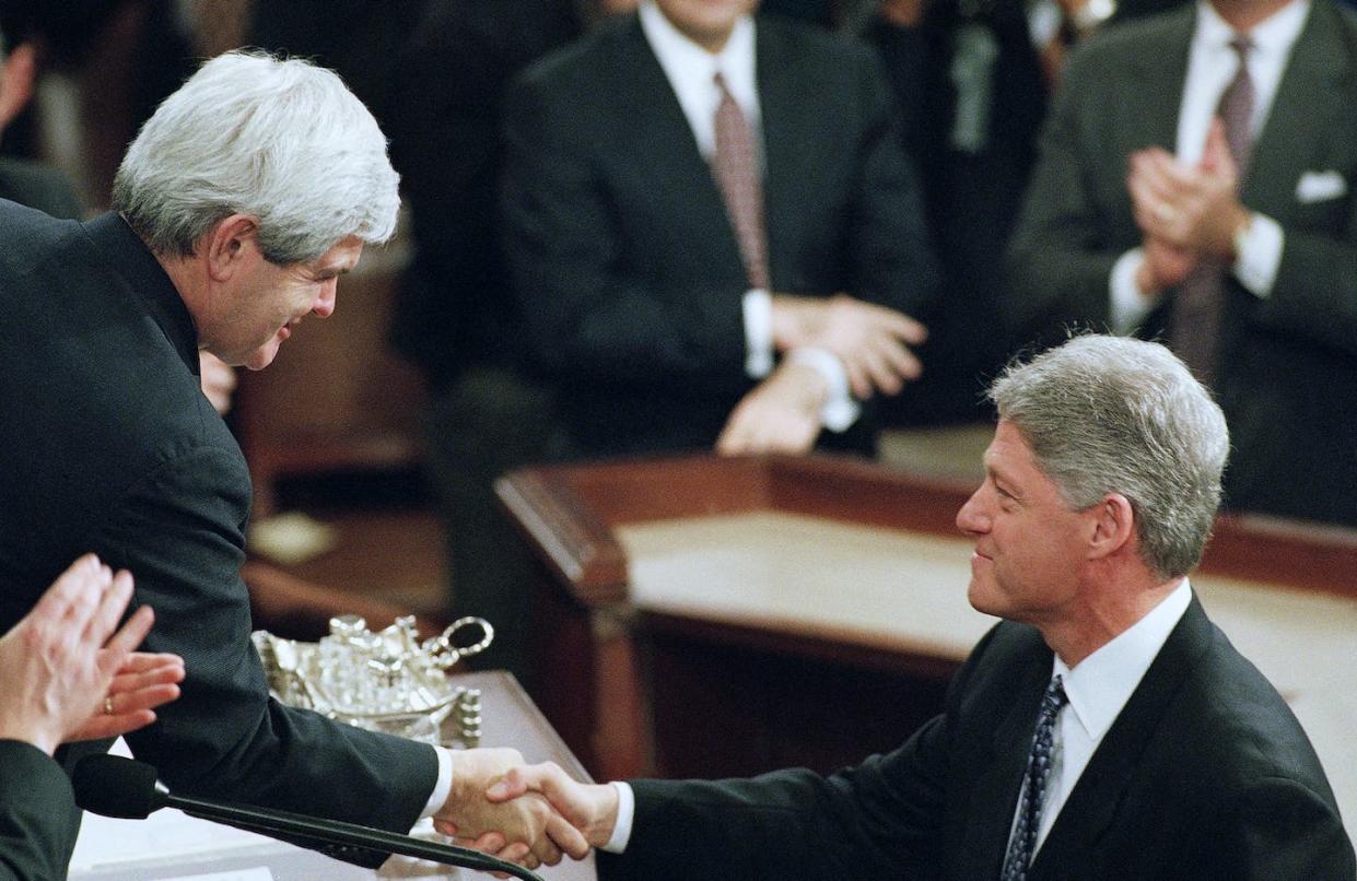 Bill Clinton, at right, oversaw the first balanced budget since 1969, with some help from a bipartisan deal with Newt Gingrich. <a href="https://newsroom.ap.org/detail/PresidentBillClintonHandshakeNewtGingrich/0bb5ca6edcaf46bd97a5b7bda3ab6cfc/photo?Query=clinton%20gingrich&mediaType=photo&sortBy=arrivaldatetime:desc&dateRange=Anytime&totalCount=73&currentItemNo=24" rel="nofollow noopener" target="_blank" data-ylk="slk:AP Photo/Doug Mills;elm:context_link;itc:0;sec:content-canvas" class="link ">AP Photo/Doug Mills</a>