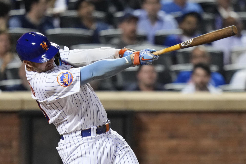 New York Mets' Pete Alonso follows through on a two-run home run against the Arizona Diamondbacks during the fifth inning of a baseball game Tuesday, Sept. 12, 2023, in New York. (AP Photo/Frank Franklin II)