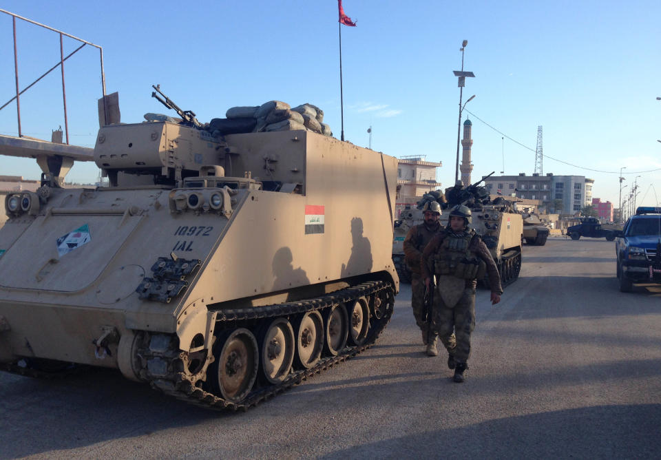 In this picture taken on Saturday, Feb. 1, 2014, Iraqi Security forces patrol in Ramadi, 70 miles (115 kilometers) west of Baghdad, Iraq. Al-Qaida-linked fighters and their allies seized control of the city of Fallujah and parts of the Anbar provincial capital Ramadi last month after authorities dismantled a protest camp by Sunnis angry at what they consider second-class treatment by the Shiite-led government. The government and its tribal allies are besieging the rebel-held areas, with fighting reported daily. (AP Photo)