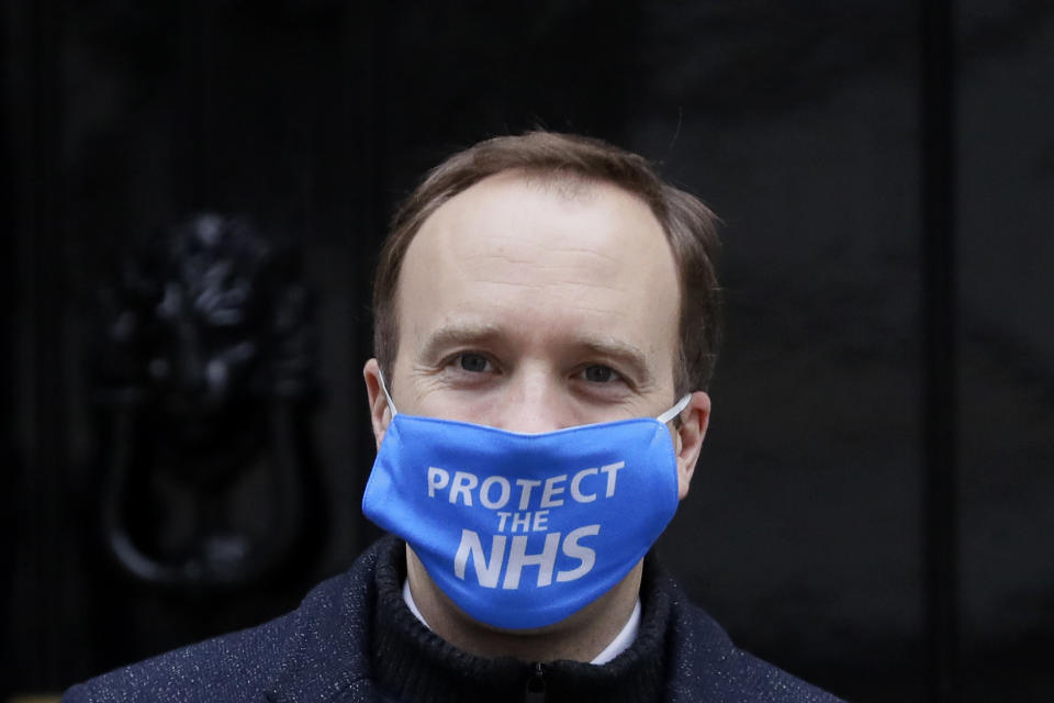 Britain's Health Secretary Matt Hancock leaves Downing Street in London, Wednesday, Dec. 2, 2020. U.K. Health Secretary Matt Hancock on Wednesday thanked scientists from Pfizer and BioNTech after the approval of their COVID-19 vaccine for emergency use by the country's drugs regulator. Speaking earlier Hancock gave details of how the vaccine would be distributed from the beginning of next week. (AP Photo/Kirsty Wigglesworth)