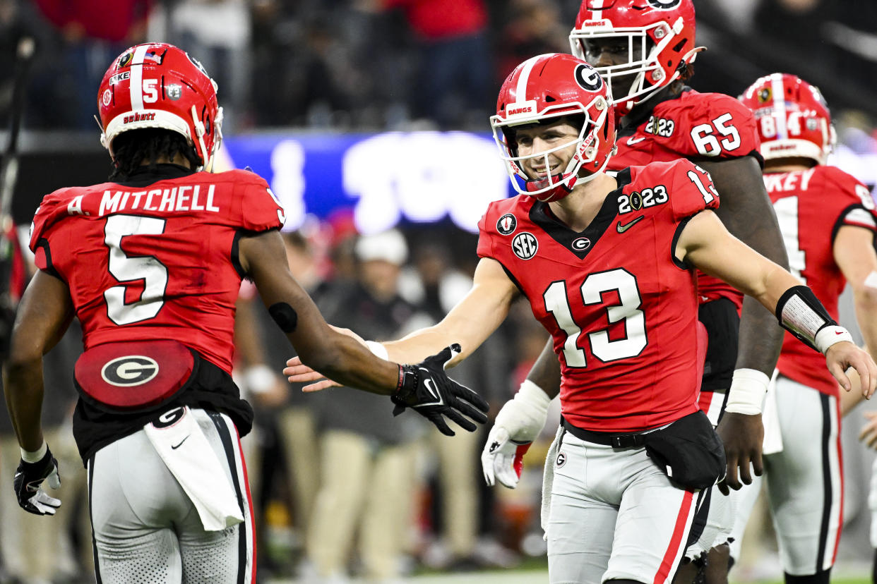 Stetson Bennett (13) and Georgia made it look easy against TCU for the Bulldogs' second straight national title. (Wally Skalij / Los Angeles Times via Getty Images)