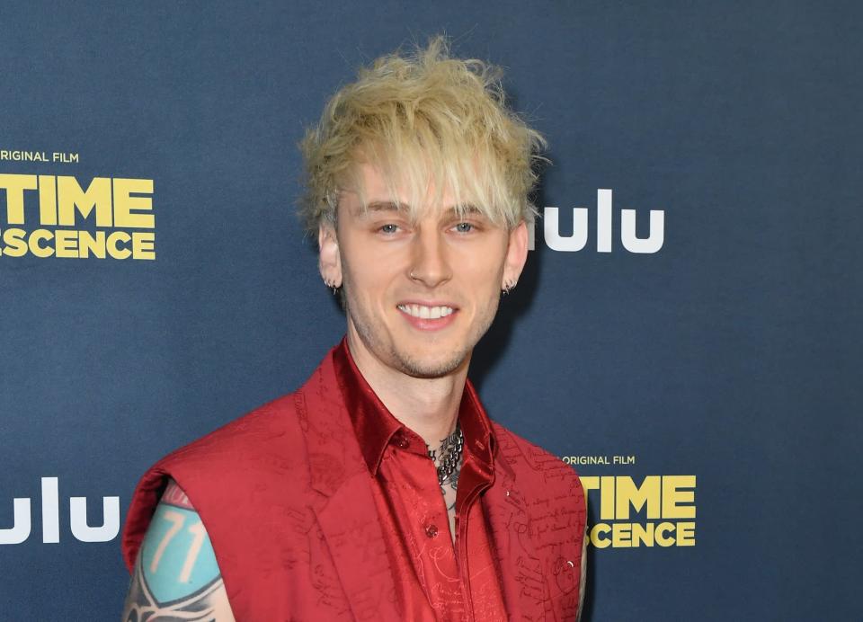 <p>Megan first met the rapper on the set of <strong>Midnight in the Switchgrass</strong> in March 2020, and they've been inseparable ever since. In May 2020, MGK dropped <a href="https://www.youtube.com/watch?v=wSdT-SArM2Q&amp;feature=emb_title" class="link rapid-noclick-resp" rel="nofollow noopener" target="_blank" data-ylk="slk:his video for &quot;Bloody Valentine,&quot;">his video for "Bloody Valentine,"</a> in which Megan plays his love interest. The song also features lyrics like "I'm calling you girlfriend" and "In my head, I'm laying naked with you." </p> <p>In June 2020, <a href="https://www.dailymail.co.uk/tvshowbiz/article-8425303/Megan-Fox-EXCLUSIVE-Actress-confirms-romance-Machine-Gun-Kelly-share-kiss.html" class="link rapid-noclick-resp" rel="nofollow noopener" target="_blank" data-ylk="slk:the two basically confirmed their romance">the two basically confirmed their romance</a> when they were spotted kissing in LA. According to Megan, <a href="https://www.popsugar.com/celebrity/megan-fox-and-machine-gun-kelly-relationship-timeline-47676371" class="link rapid-noclick-resp" rel="nofollow noopener" target="_blank" data-ylk="slk:their connection was pretty instantaneous">their connection was pretty instantaneous</a>. "I was in a room with him and said hello to him and looked into his eyes . . . I knew right away that he was what I call a twin flame," Megan said of her first interaction with MGK during the podcast <strong>Give Them Lala . . . With Randall</strong>. "Instead of a soulmate, a twin flame is actually where a soul has ascended into a high enough level that it can be split into two different bodies at the same time. So we're actually two halves of the same soul, I think. And I said that to him almost immediately, because I felt it right away, so I think it was the second day, I asked him to come into my trailer for lunch, and I put him through all of this astrology stuff . . . I went deep right away. I knew before I even did his chart, I said to him, he has a Pisces moon. I could tell by his energy."</p> <p>The two officially sealed their union as twin flames <a href="https://www.popsugar.com/celebrity/machine-gun-kelly-megan-fox-engaged-48679541" class="link rapid-noclick-resp" rel="nofollow noopener" target="_blank" data-ylk="slk:when they got engaged">when they got engaged</a> on Jan. 11 in Puerto Rico, "beneath the same branches we fell in love under." MGK even pulled out all the stops to design Megan's <a href="https://www.popsugar.com/fashion/megan-fox-engagement-ring-photos-48679635" class="link rapid-noclick-resp" rel="nofollow noopener" target="_blank" data-ylk="slk:gorgeous toi et moi engagement ring">gorgeous toi et moi engagement ring</a>. "I know tradition is one ring, but I designed it with Stephen Webster to be two: the emerald (her birth stone) and the diamond (my birth stone) set on two magnetic bands of thorns that draw together as two halves of the same soul forming the obscure heart that is our love," he captioned a <a href="https://www.instagram.com/tv/CYpcFruB2UB/?utm_source=ig_web_copy_link" class="link rapid-noclick-resp" rel="nofollow noopener" target="_blank" data-ylk="slk:video showing off Megan's ring">video showing off Megan's ring</a>. </p>