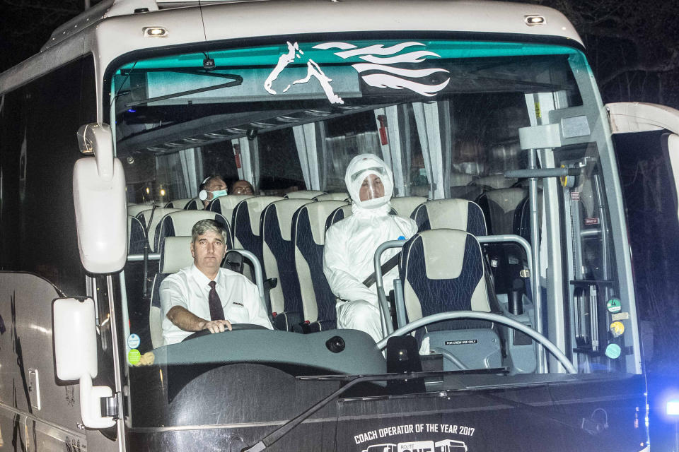 British citizens arrive at Arrowe Park Hospital in Wirral, Merseyside after being evacuated and flown back to RAF Brize Norton in Oxfordshire England amid a contagious virus outbreak in Wuhan, China - 31st January 2020