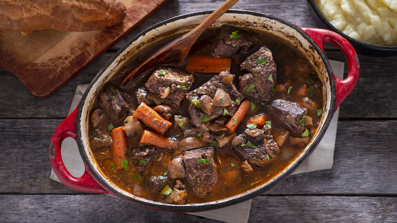 beef bourguignon served in ceramic vessel