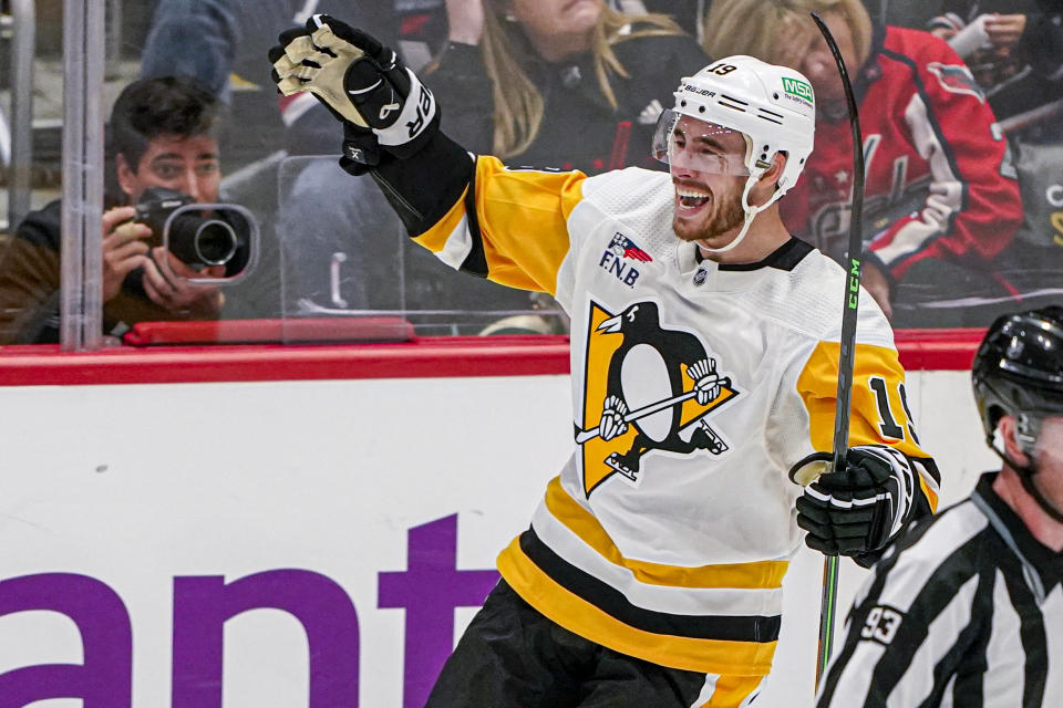 Pittsburgh Penguins right wing Reilly Smith celebrates his goal against the Washington Capitals during the third period of an NHL hockey game Friday, Oct. 13, 2023, in Washington. The Penguins won 4-0. (AP Photo/Andrew Harnik)