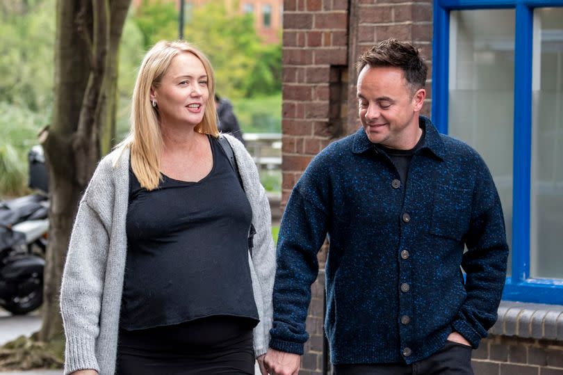 Ant McPartlin smiles at his heavily pregnant wifes massive baby bump as they join Jamie Redknapp for lunch -Credit:MJ-Pictures.com