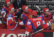 Russia's Alexander Ovechkin (2nd R) celebrates with his teammates after scoring against Slovakia during the final game of the IIHF International Ice Hockey World Championship in Helsinki on May 20, 2012. AFP PHOTO / ALEXANDER NEMENOVALEXANDER NEMENOV/AFP/GettyImages