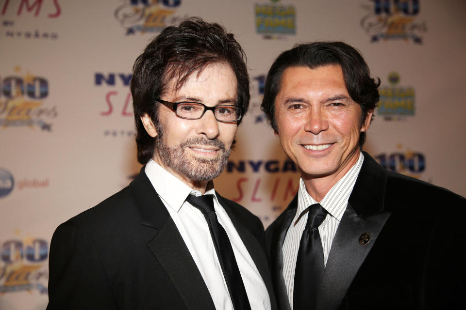 George Chakiris, left, and Lou Diamond Phillips arrive at the 24th Night of 100 Stars Oscars Viewing Gala at The Beverly Hills Hotel on Sunday, March 2, 2014 in Beverly Hills, Calif. (Photo by Annie I. Bang /Invision/AP)