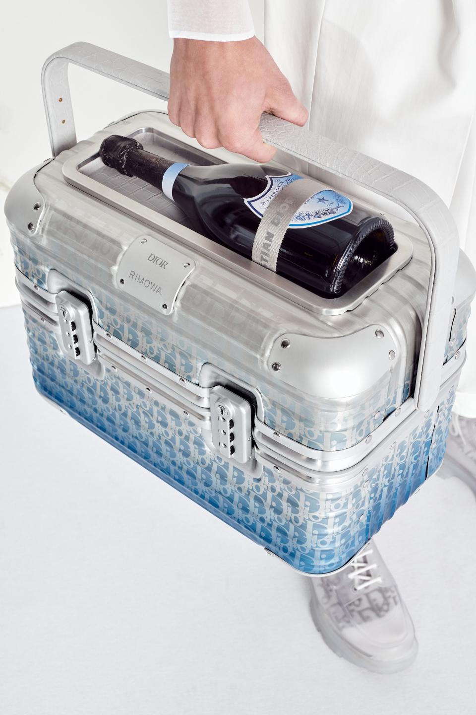 The Dior Men x Rimowa Champagne carrier