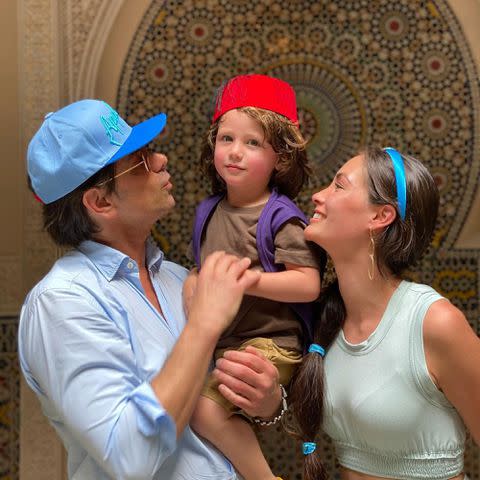 <p>John Stamos Instagram</p> John Stamos and Caitlin McHugh Stamos with their son Billy.