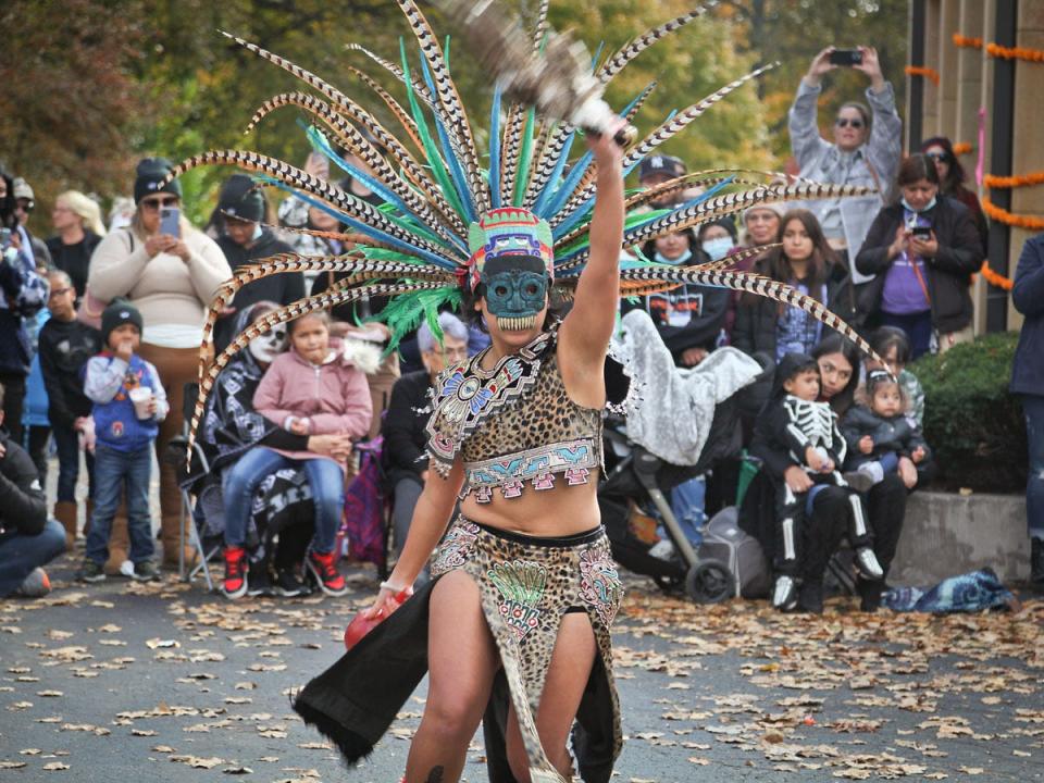 A dancer performs at a past Dia de los Muertos Festival at Forest Home Cemetery.