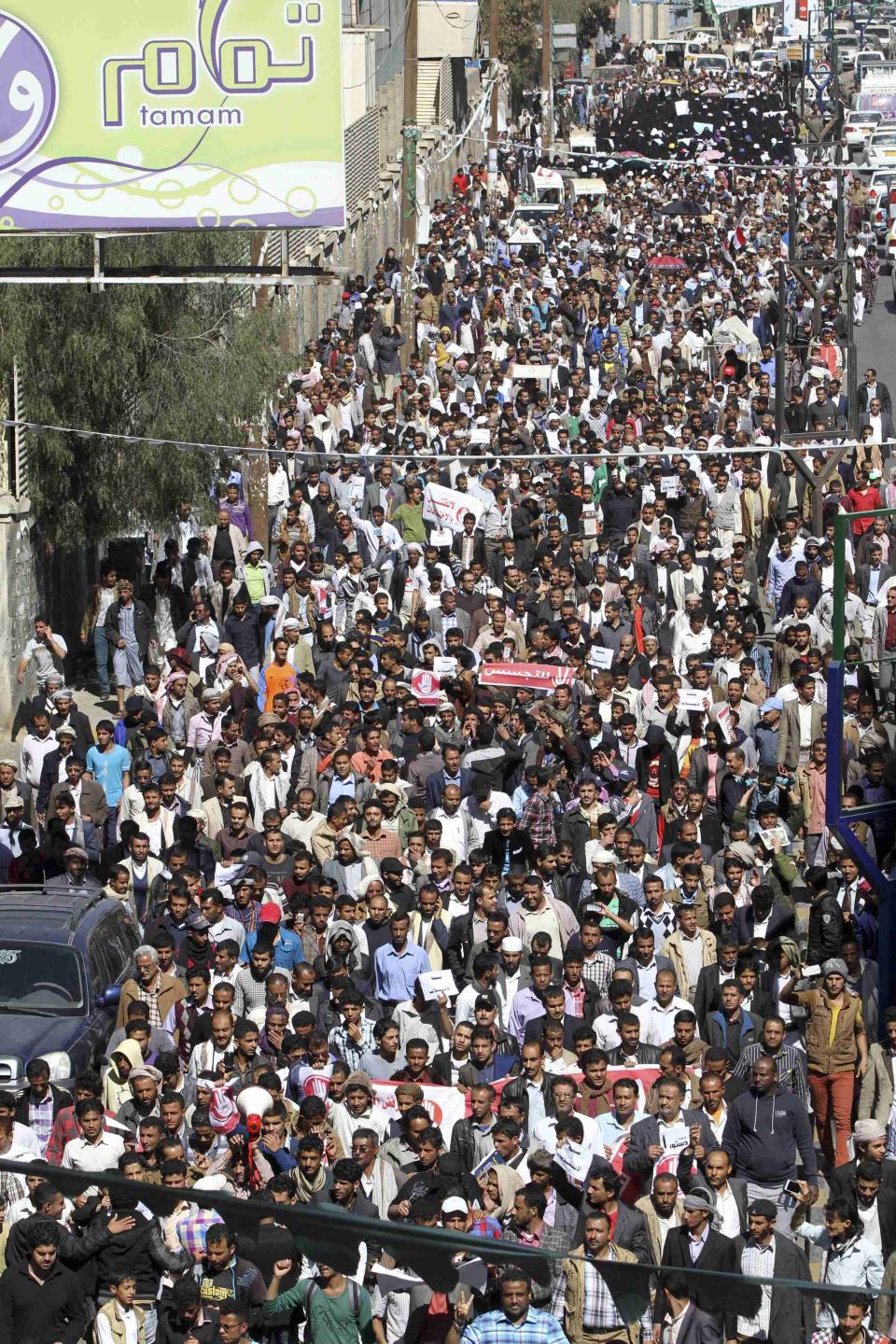 Anti-Houthi protesters take part during a rally in Sanaa