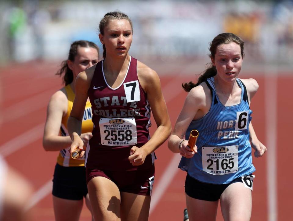 State College’s Marlee Kwasnica competes in the first leg of the girls Class 3A 4x800 meter relay finals during the PIAA State Track and Field Championships held Saturday at Seth Grove Stadium on the Shippensburg University campus in Shippensburg.