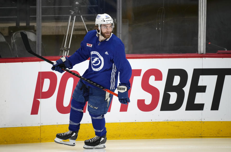 Tampa Bay Lightning center Brayden Point takes the ice during an NHL hockey practice before Game 1 of the Stanley Cup Finals against the Colorado Avalanche Tuesday, June 14, 2022, in Denver. (AP Photo/David Zalubowski)