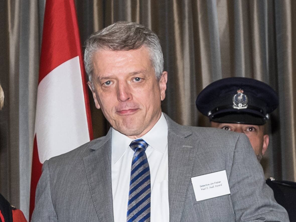 Former Vancouver police detective James Fisher receives a 2014 Community Safety and Crime Prevention award.  (Government of British Columbia - image credit)