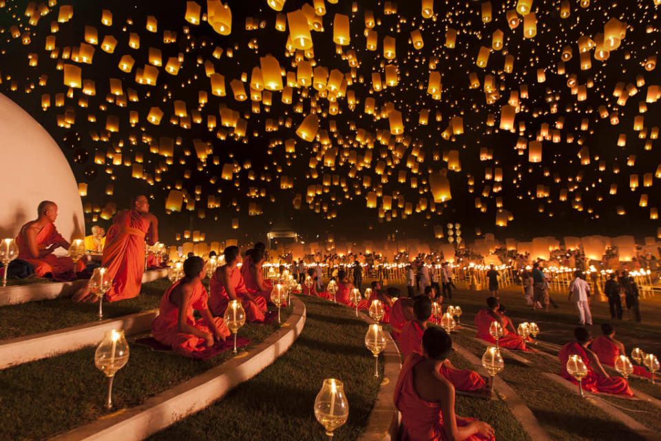 Monks looked up at the magnificent night sky filled with thousands of lanterns in awe. Yi Peng lantern festival is meant as a time for tham bun to make merit. This was the moment I've been waiting for and it lasted very quickly due to strong wind. A very heavy downpour occurred right after we left the place. The lanterns were made of organic materials. (Ng Chai Hock, Singapore, Shortlist, Arts and Culture, Open competition 2013 Sony World Photography Awards) <br> <br> <a href="http://worldphoto.org/about-the-sony-world-photography-awards/" rel="nofollow noopener" target="_blank" data-ylk="slk:Click here to see the full shortlist at World Photography Organisation;elm:context_link;itc:0;sec:content-canvas" class="link ">Click here to see the full shortlist at World Photography Organisation</a>