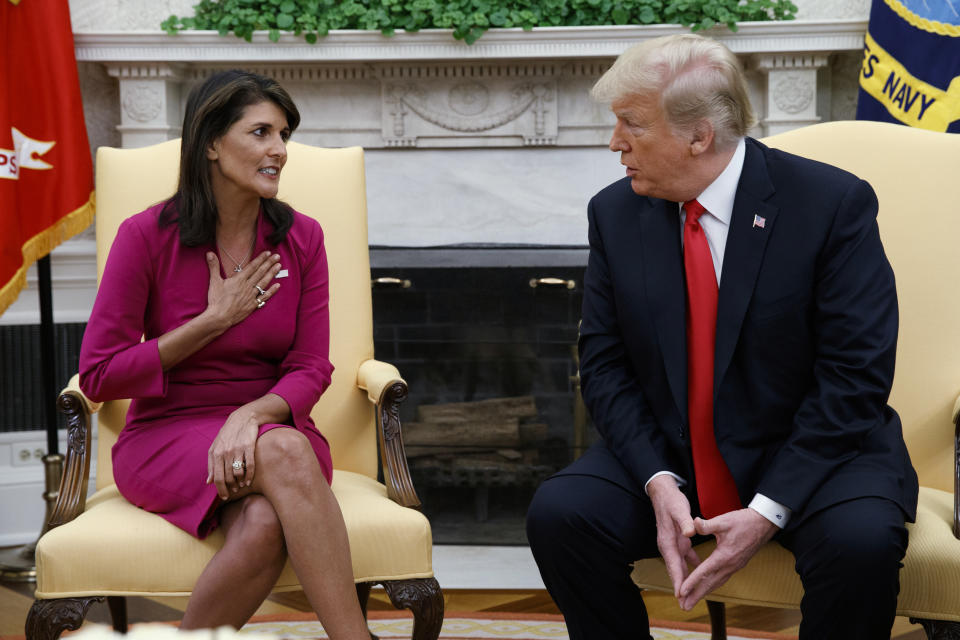 FILE - President Donald Trump meets with outgoing U.S. Ambassador to the United Nations Nikki Haley in the Oval Office of the White House, Oct. 9, 2018, in Washington. (AP Photo/Evan Vucci, File)