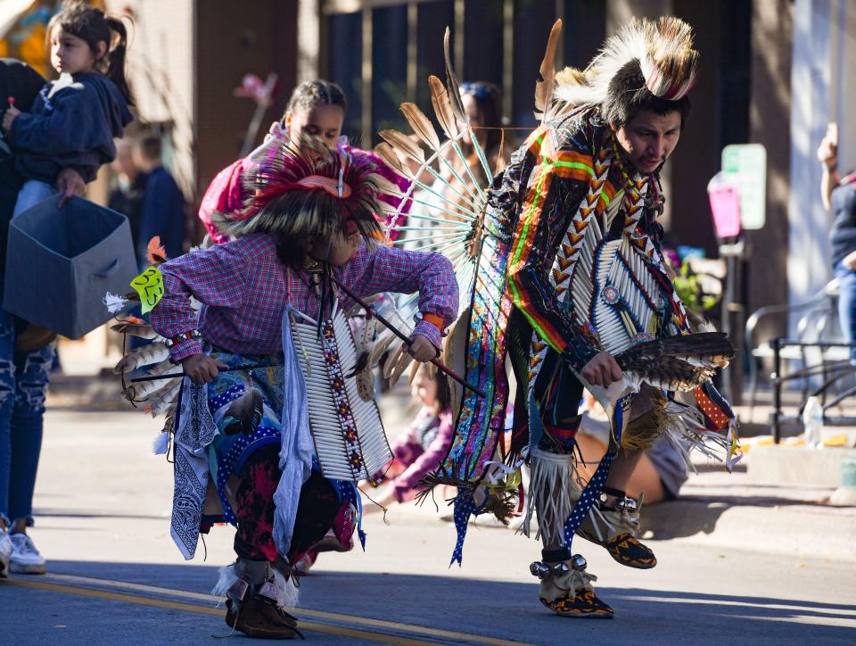 Dancers participate in the Native American Day parade on Monday, October 10, 2022, on Phillips Avenue in Sioux Falls.