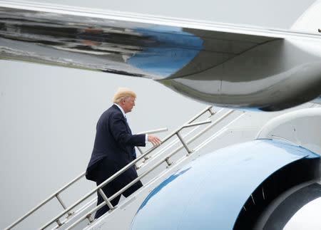 U.S. President Donald Trump boards Air Force One prior to departing Morristown Municipal Airport en route Camp David, Maryland, where he'll meet with his national security team to discuss a U.S. security strategy for South Asia that includes sending more U.S. soldiers to Afghanistan, in Morristown, New Jersey, U.S., August 18, 2017. REUTERS/Kevin Lamarque