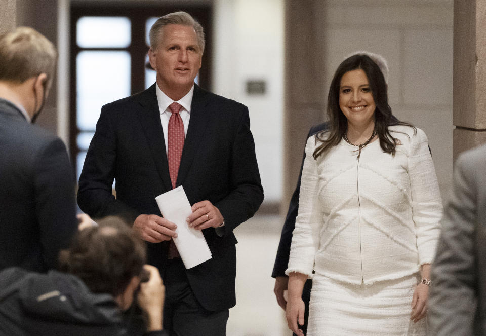 House Minority Leader Kevin McCarthy of Calif., left, and Rep. Elise Stefanik, R-N.Y., walk to speak with reporters on Capitol Hill Friday, May 14, 2021, in Washington. Republicans have vaulted Rep. Elise Stefanik into the ranks of House leadership. The upstate New York Republican was elected to the party's No. 3 post on Friday. (AP Photo/Alex Brandon)