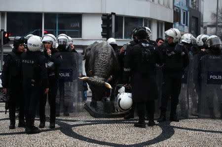 Riot police stand guard during a protest against Turkey's military operation in Syria's Afrin region, in Istanbul, Turkey January 21, 2018. REUTERS/Umit Bektas