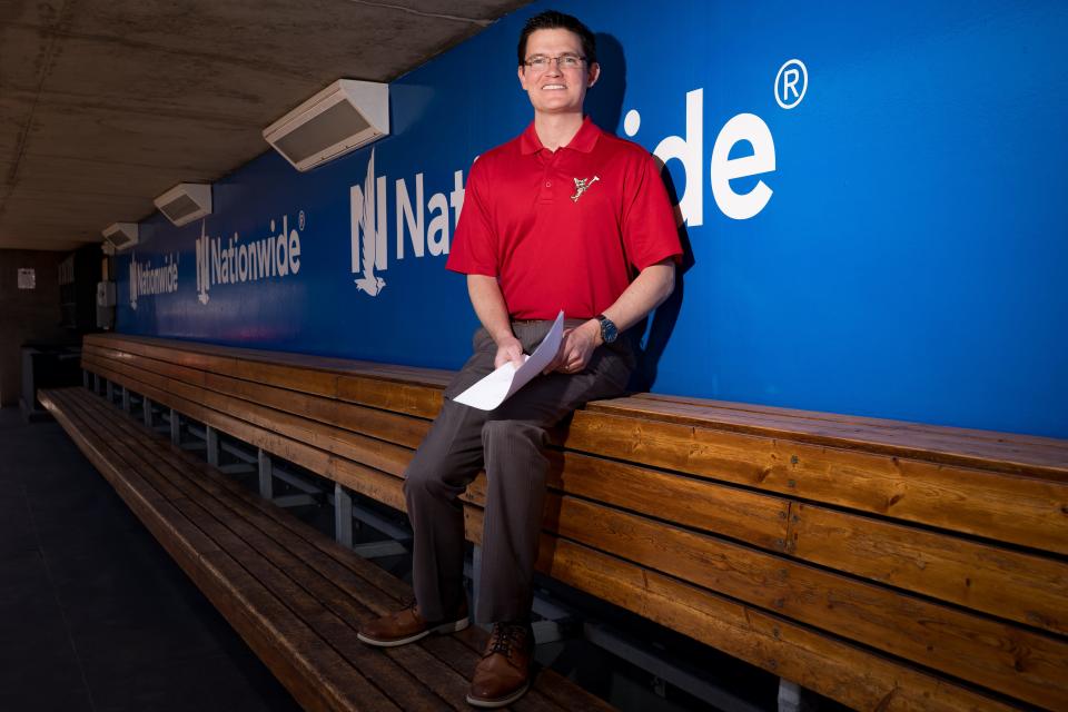 El Paso Chihuahuas broadcaster Tim Hagerty poses for a photos at the dugout at the Southwest University Park on Wednesday, March 29, 2023.
