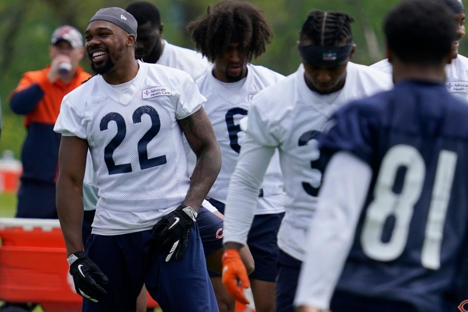 Chicago Bears defensive back Kindle Vildor (22), a former Georgia Southern star, smiles as he talks with teammates at the NFL team's practice facility in Lake Forest, Illinois on May 24, 2022. Vildor is one of the defensive backs on the ballot for the 40-Year Football Team.