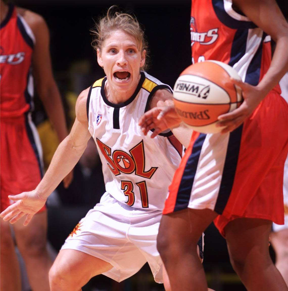 Miami’s Debbie Black guards a Houston player during the Sol’s 84-62 win at American Airlines Arena.