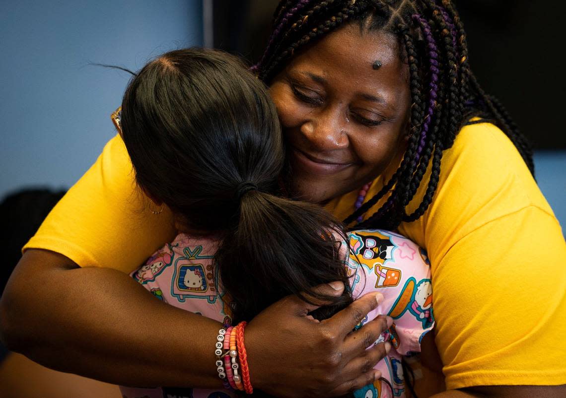 Dhima Martin, right, hugs Sara Duque, who was her daughter Symaria Glenn’s nurse after a press conference on Tuesday, April 9, 2024, at Memorial Regional Hospital’s Transplant Institute in Hollywood, Fla. Glenn’s were donated when she died to save five people, including her father Shawn who was waiting a kidney transplant.