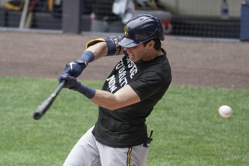 Milwaukee Brewers' Christian Yelich strikes out during an intrasquad game Tuesday, July 21, 2020, at Miller Park in Milwaukee. (AP Photo/Morry Gash)