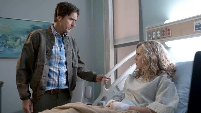 DC's Stargirl -- The CW TV Series, Stargirl -- "Shiv Part Two" -- Image Number: STG108c_0073r.jpg -- Pictured (l-R): Luke Wilson as Pat Dugan and Brec Bassinger as Courtney Whitmore -- Photo: Mark Hill/The CW -- © 2020 The CW Network, LLC. All Rights Reserved. Luke Wilson, left, and Brec Bassinger in "DC's Stargirl" on The CW.