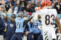 Tennessee Titans cornerback Roger McCreary (21) celebrates blocking a pass against the Cincinnati Bengals during the first half of an NFL football game, Sunday, Nov. 27, 2022, in Nashville, Tenn. (AP Photo/Gerald Herbert)