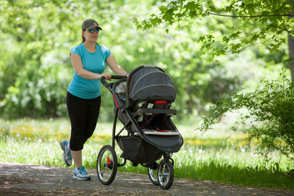 Pushing a child in a buggy can be a great strength and cardio exercise. (Getty Images)