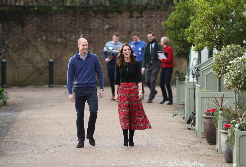 The Duke and Duchess of Cambridge arrive for the Christmas party (PA)