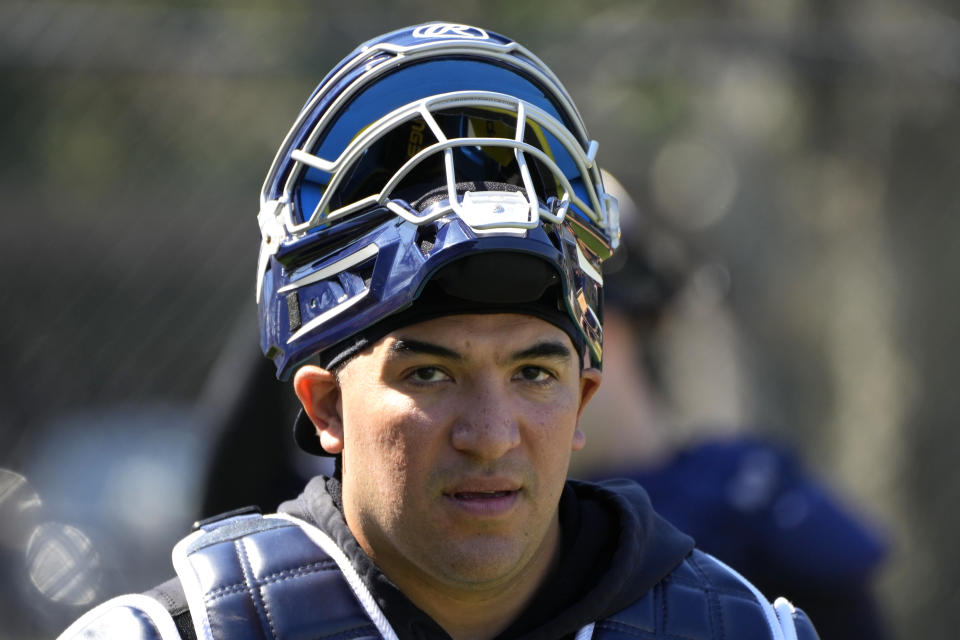 New York Yankees catcher Jose Trevino watches a baseball spring training workout Wednesday, Feb. 21, 2024, in Tampa, Fla. (AP Photo/Charlie Neibergall)
